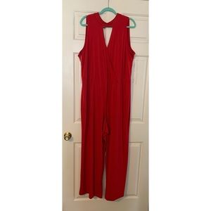 Red jump suit w/ V-halter neck line and back